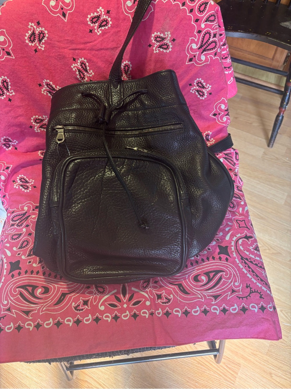 Johnny Farah black leather sling backpack